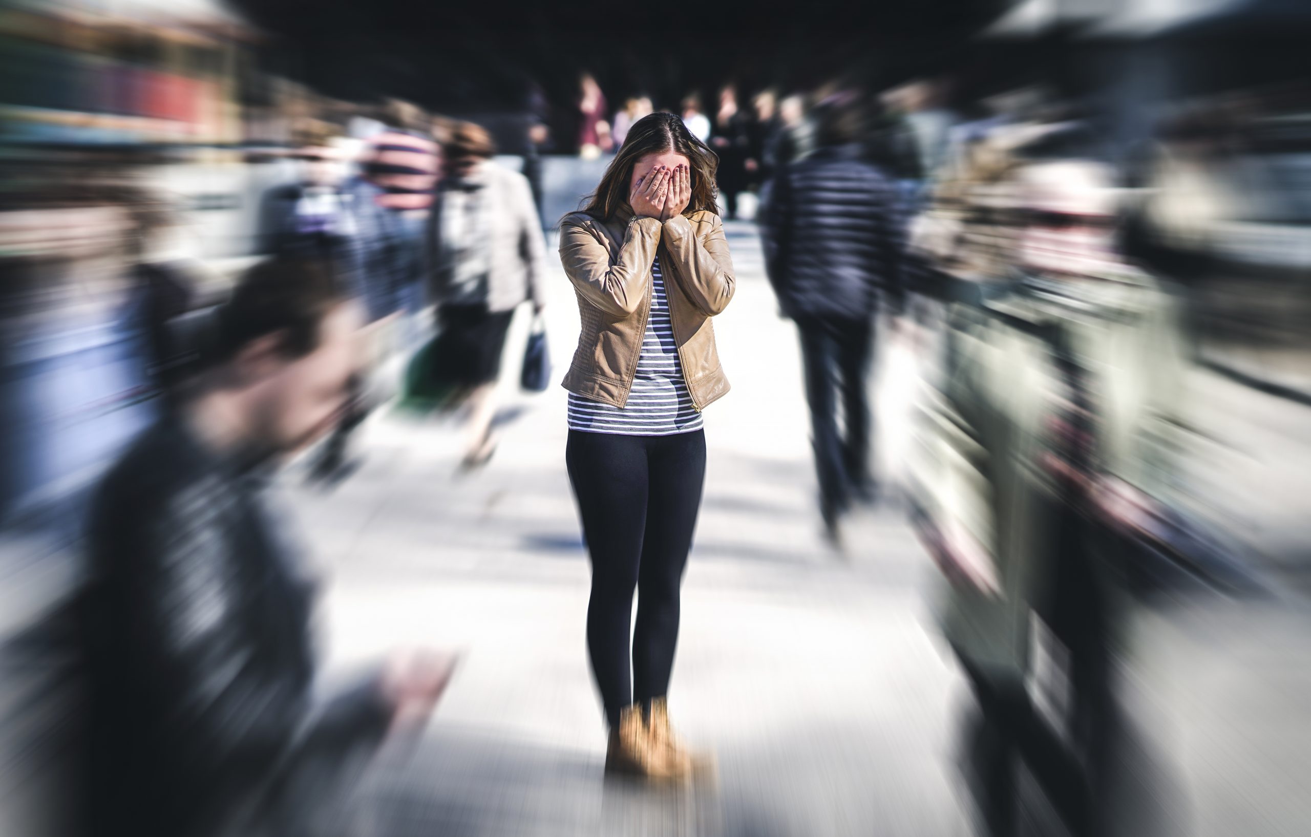 Phobias: A woman standing in a crowd