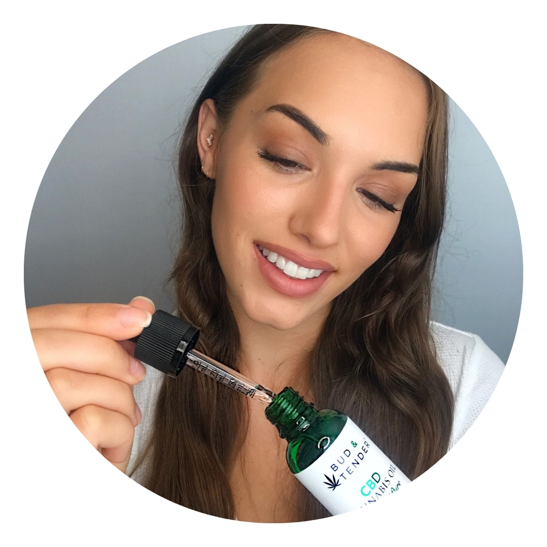 Bud & Tender: A woman sampling a CBD oil