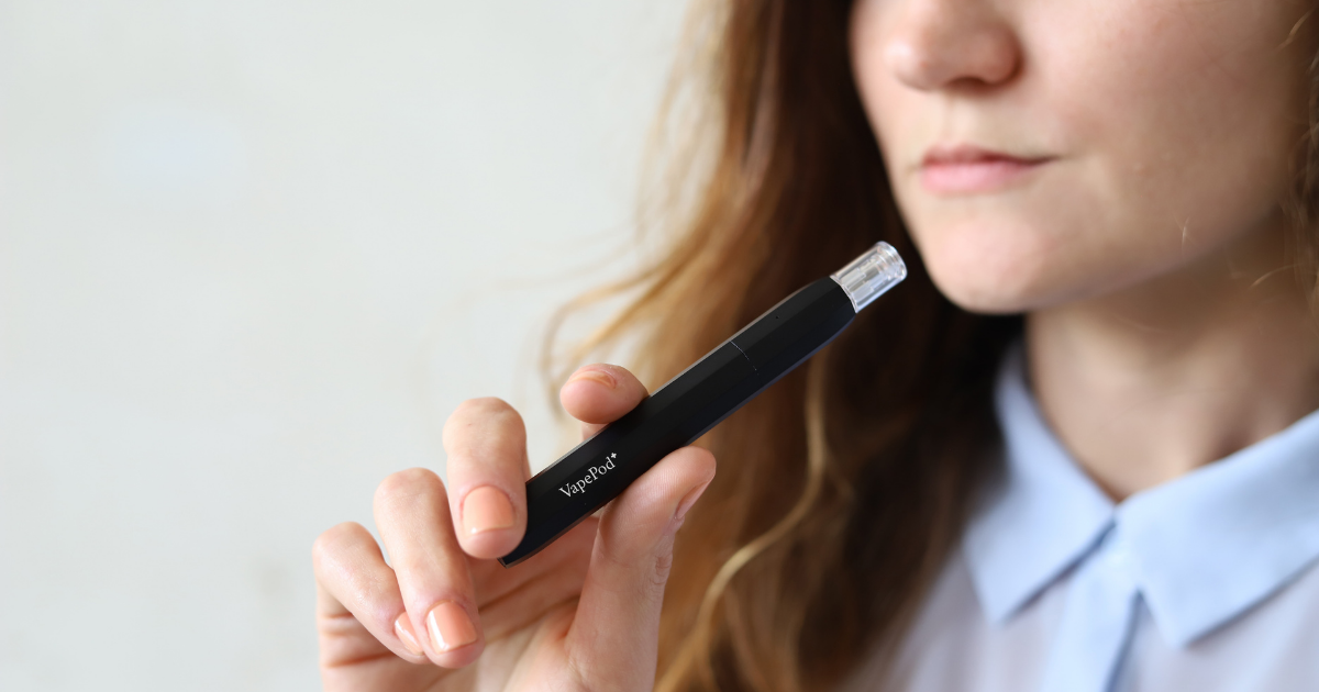 Terpenes: A person holding a Kanabo vape